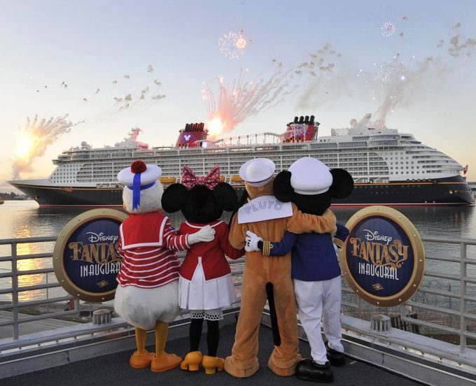 DISNEY FANTASY ARRIVES IN PORT CANAVERAL: In a photo taken March 6, 2012, fireworks light the morning sky as the Disney Fantasy, the newest Disney Cruise Line ship, arrives in her home port of Port Canaveral, Fla. after traveling nearly 4,700 miles across the Atlantic Ocean from Bremerhaven, Germany. The 4,000-passenger Disney Fantasy will welcome guests on her maiden voyage on Mar. 31, 2012, sailing seven-night cruises to the Caribbean and Disneys private island Castaway Cay, from Port Canaveral. (Gene Duncan/Disney, photographer)